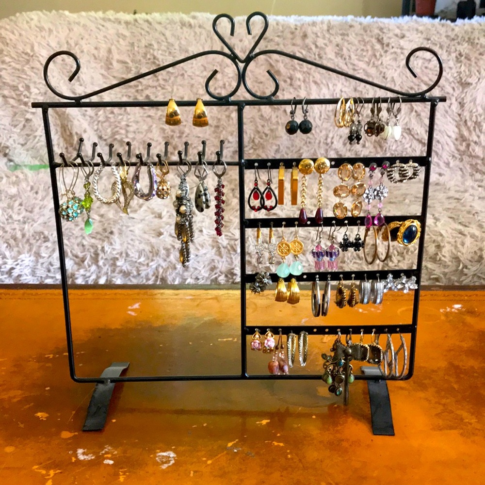 All earrings and rack included